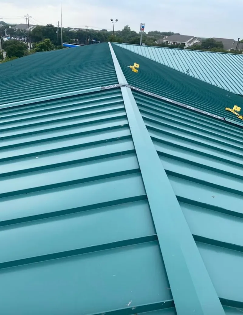 Green commercial metal roof ridge and valley for Metal Roof Repair in Uhrichsville